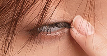 Feeling of something stuck in the eye